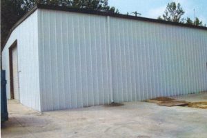Warehouse Siding and Downspout Repair